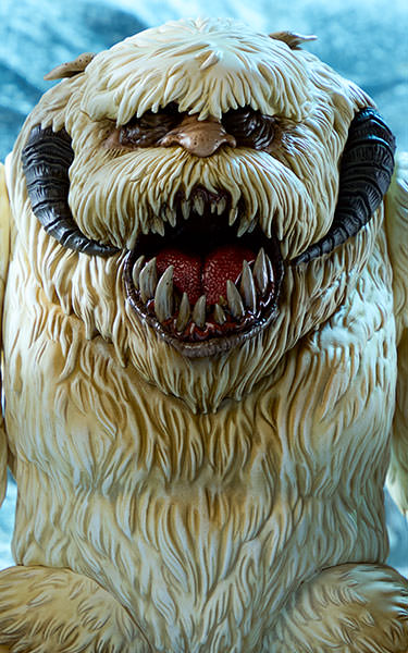 Explore Hoth at your own peril. The Wampa Designer Vinyl Figure lurks in the snow...